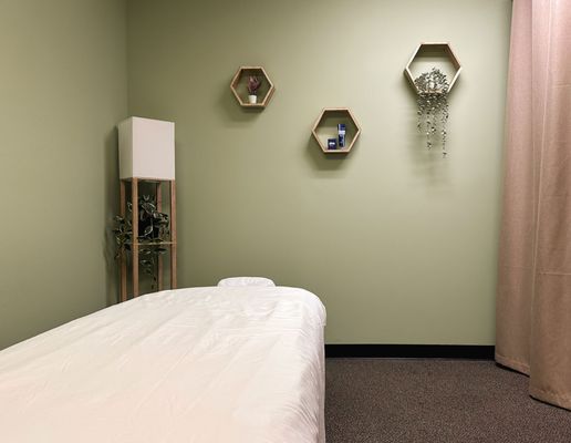 Solace Massage And Mindfulness serene treatment room in San Diego, reflecting the calm and professional environment for integrated massage and mindfulness sessions